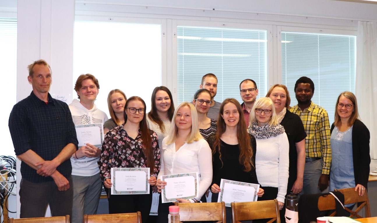 University of Turku Geovisualisation Challenge participants with their certificates, posing with the challenge client and mentors, 2019.